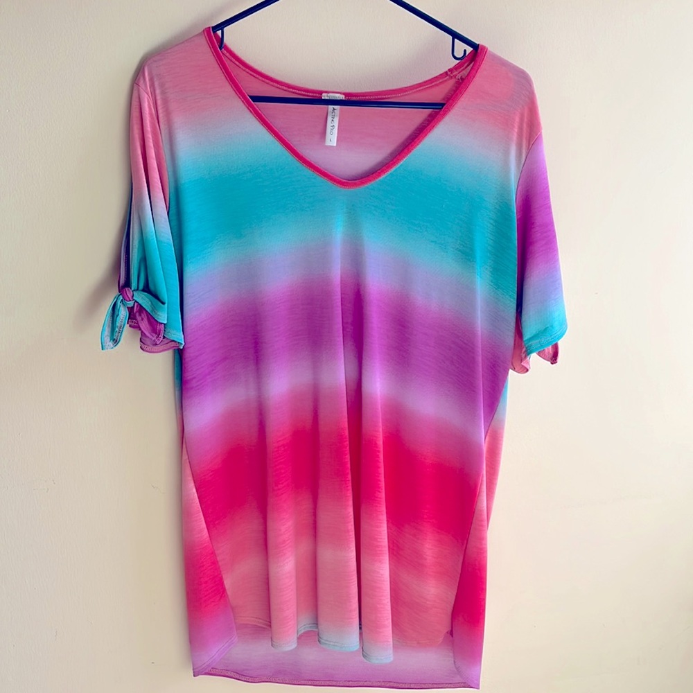 Large Acting Pro short sleeve shirt. Rainbow colors, sleeves have slit and ties.